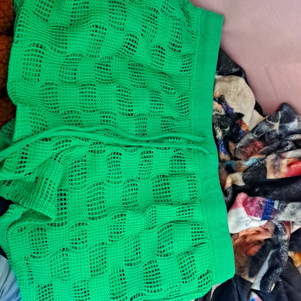Green swim shorts